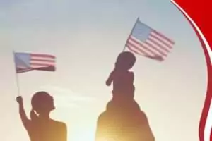 Military family waving American flags