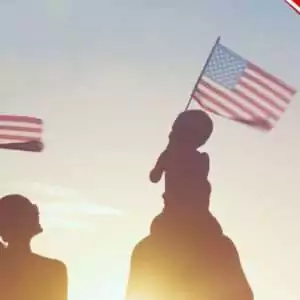 Military family waving American flags