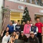Masters Swim Team Group In Lobby