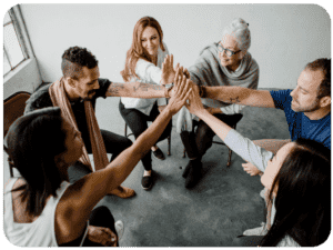 Group Of Adults In Circle Hands In 200x150
